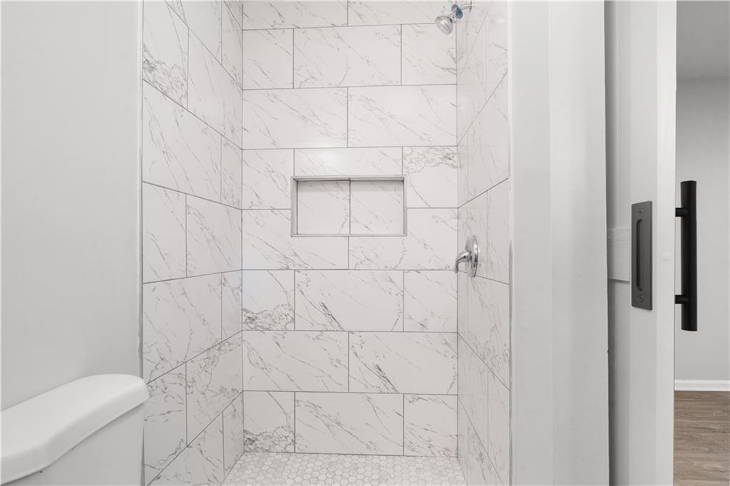 4776 Duncan Drive Powder Springs, GA 30127 - Photo 22 of 24 a bathroom with a shower