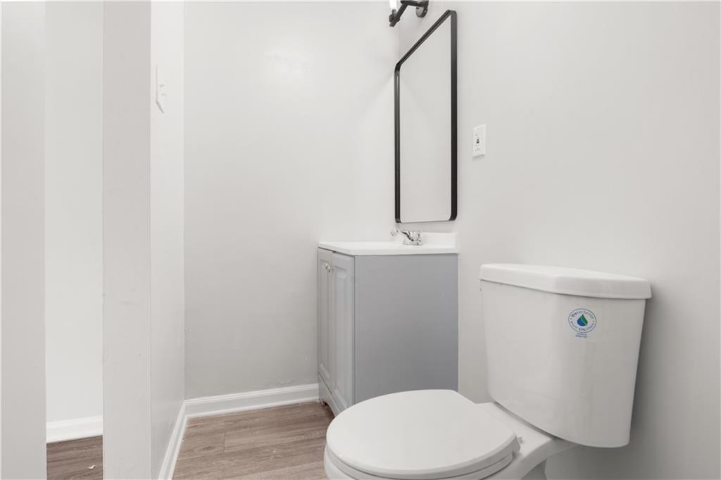 4776 Duncan Drive Powder Springs, GA 30127 - Photo 23 of 24 a white toilet sitting next to a shower