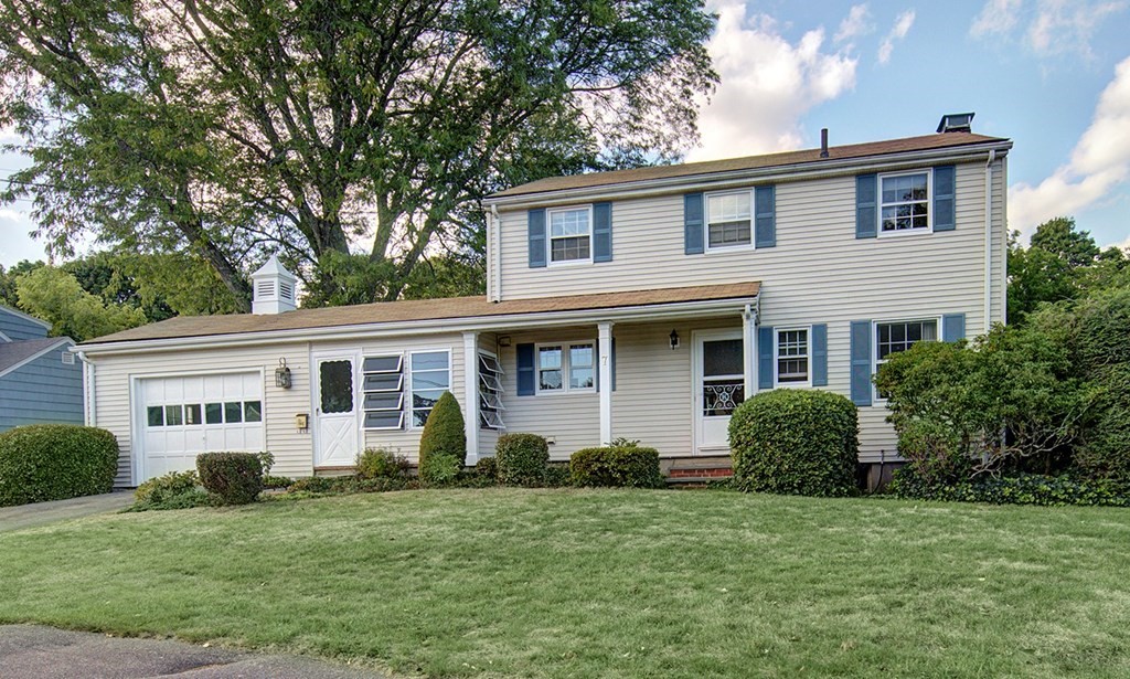 7 Rand Road Salem, MA 01970 - Photo 1 of 24 a front view of a house with a yard