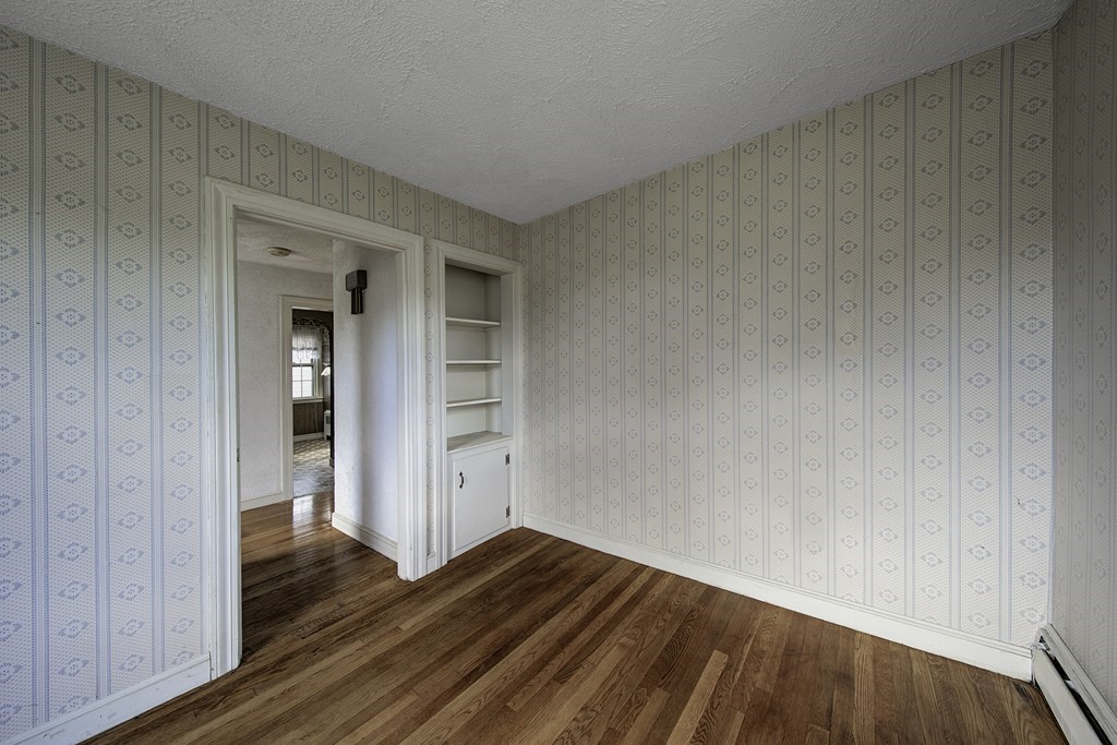 7 Rand Road Salem, MA 01970 - Photo 13 of 24 a view of a room with wooden floor