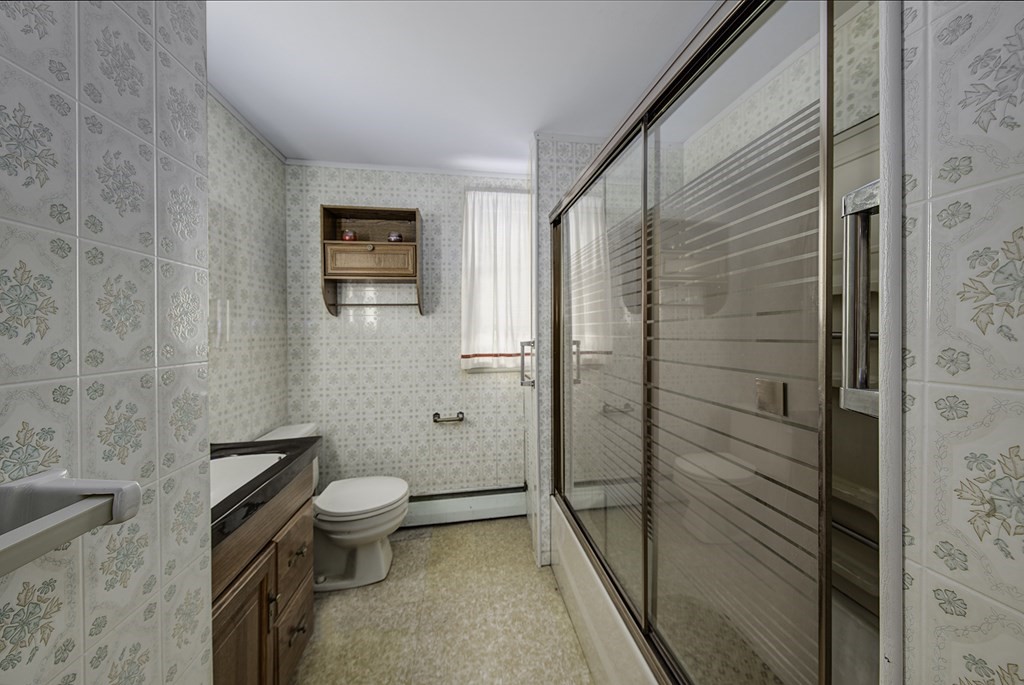 7 Rand Road Salem, MA 01970 - Photo 18 of 24 a bathroom with a toilet and a shower