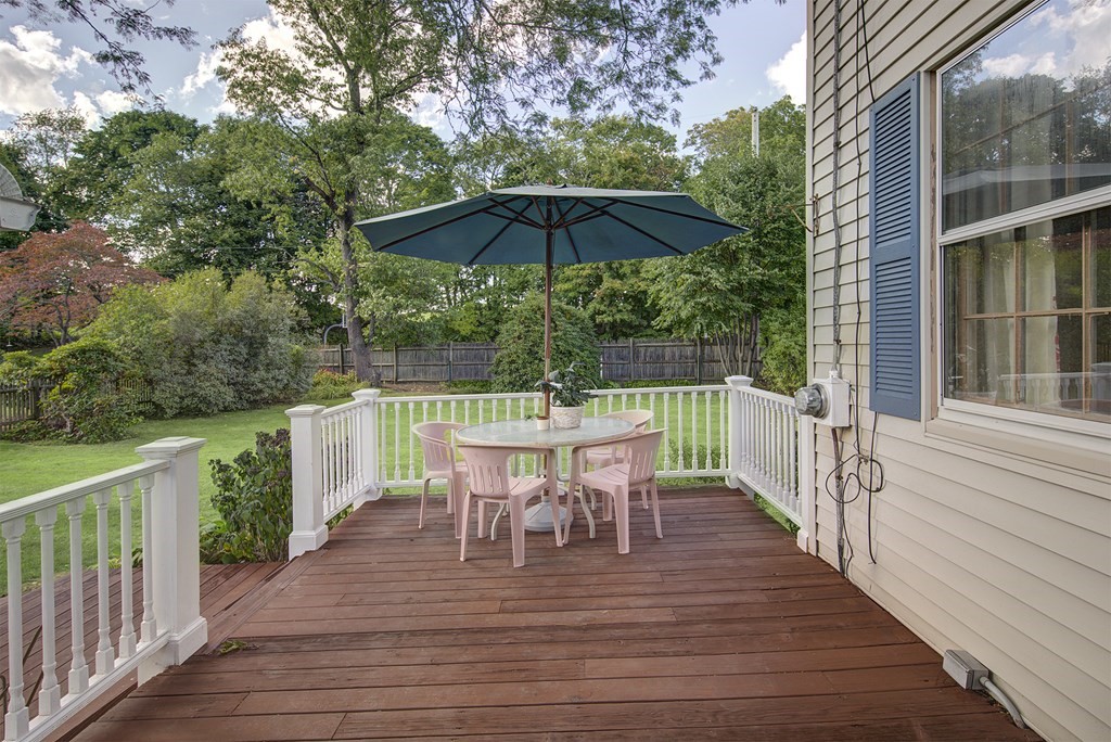 7 Rand Road Salem, MA 01970 - Photo 21 of 24 a view of a table and chairs on the roof deck