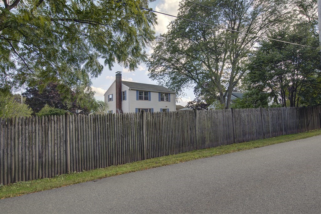 7 Rand Road Salem, MA 01970 - Photo 24 of 24 a view of a backyard with wooden fence