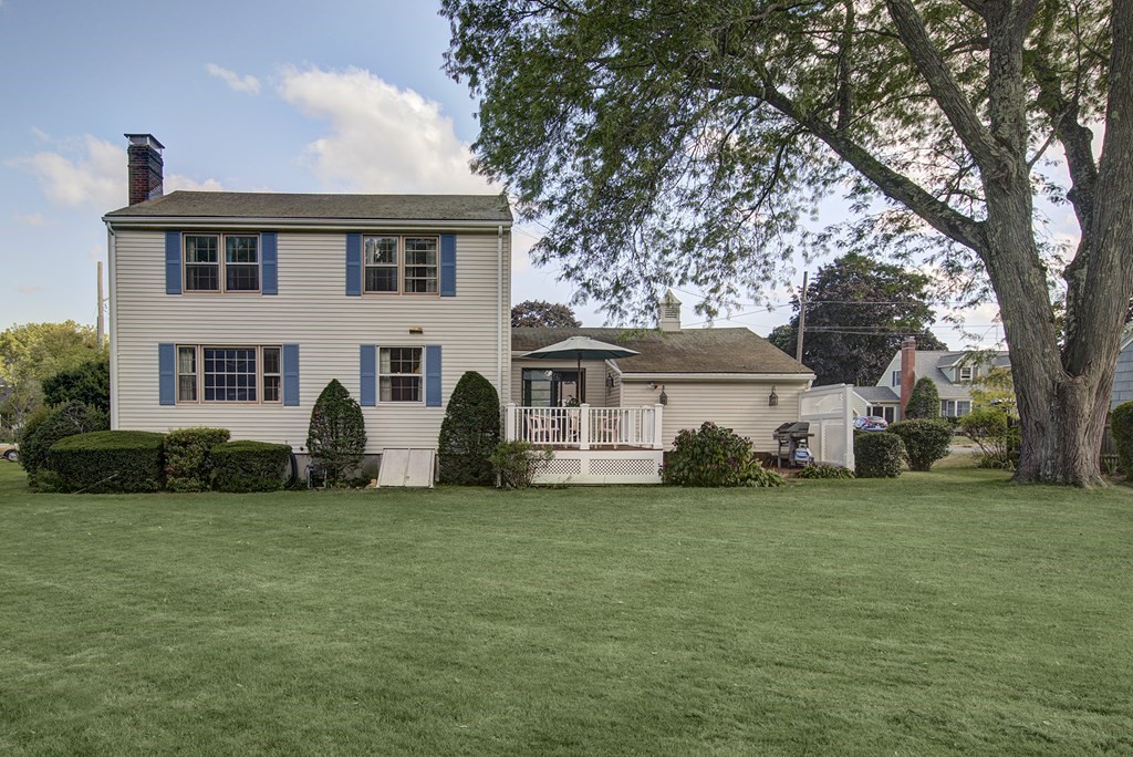 7 Rand Road Salem, MA 01970 - Photo 6 of 24 a front view of a house with a yard