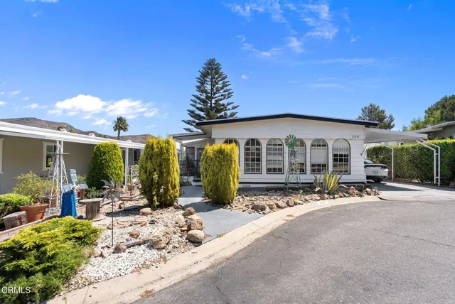 a bike parked in front of a house