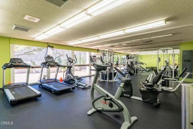a view of a room with gym equipment