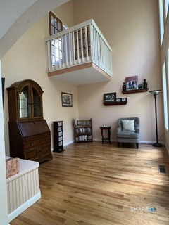 72 Pinnacle Road Ellington, CT 06029 - Photo 19 of 38 a living room with furniture and a flat screen tv