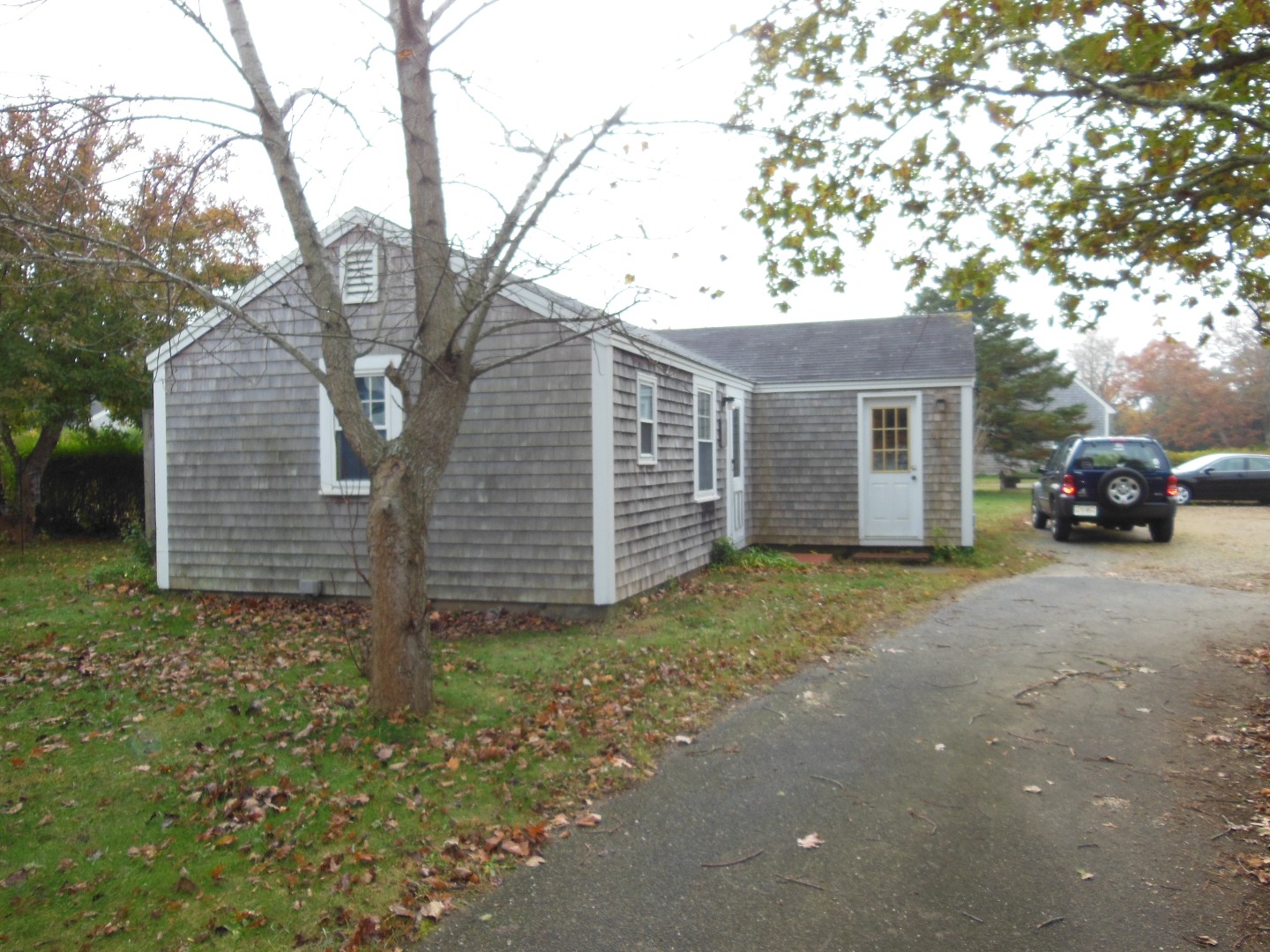 60 West Tisbury Road Edgartown, MA 02539 - Photo 4 of 24 a view of a house with a yard