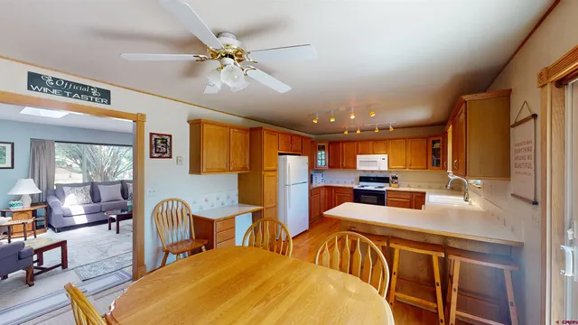 a view of a dining room with furniture