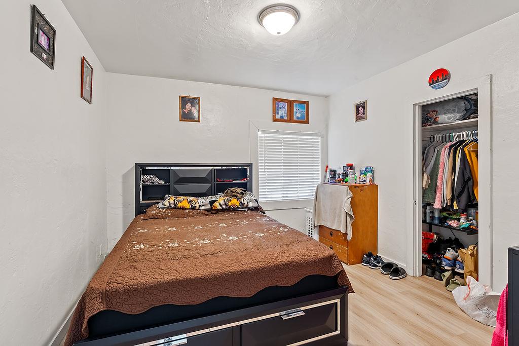 1205 Grand Avenue Santa Rosa, CA 95404 - Photo 17 of 27 a bed sitting in a bedroom and desk
