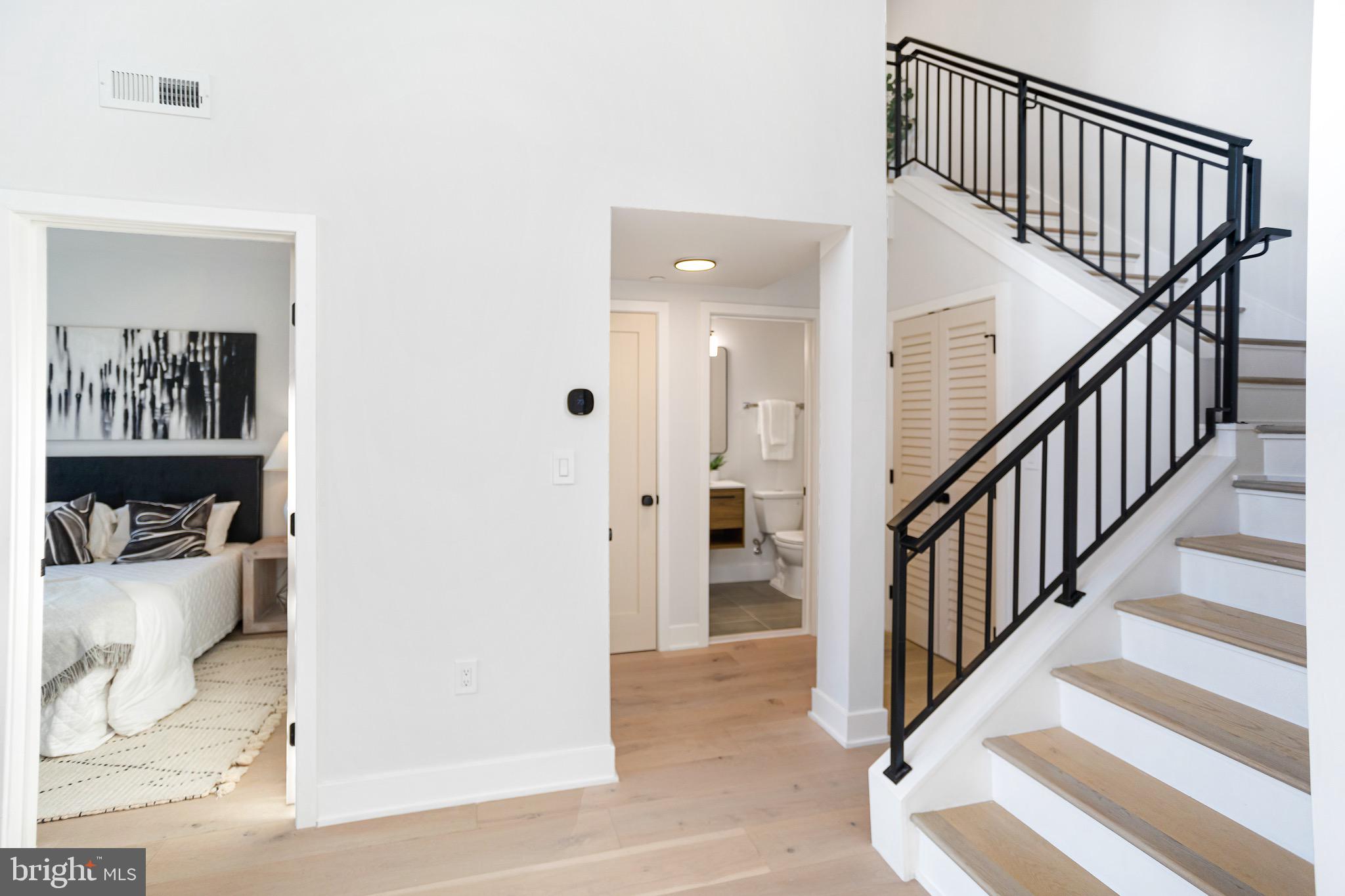 845 19th Street Northeast, Unit PH10 Washington, DC 20002 - Photo 14 of 22 a view of staircase with white walls and a potted plant