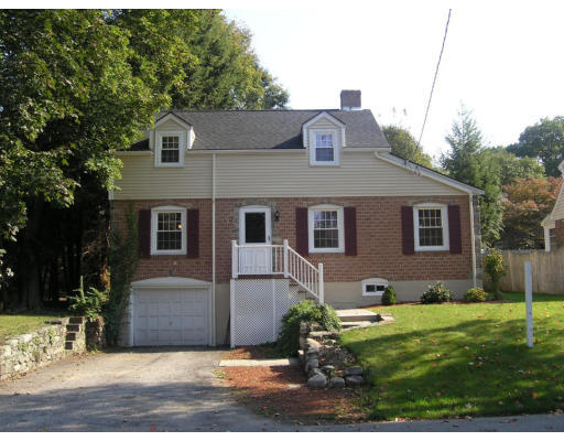 31 Harding Road Lexington, MA 02420 - Photo 1 of 16 a front view of a house with a yard