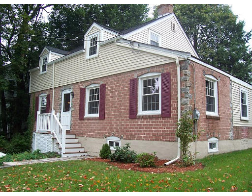 31 Harding Road Lexington, MA 02420 - Photo 2 of 16 a view of a house with a yard