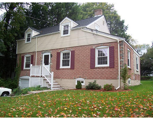 31 Harding Road Lexington, MA 02420 - Photo 3 of 16 a view of a house with a yard