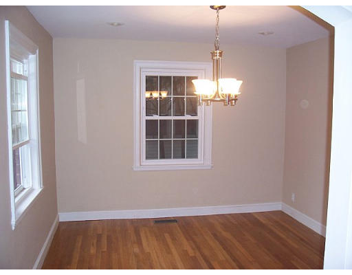 31 Harding Road Lexington, MA 02420 - Photo 5 of 16 a view of an empty room with wooden floor and a window