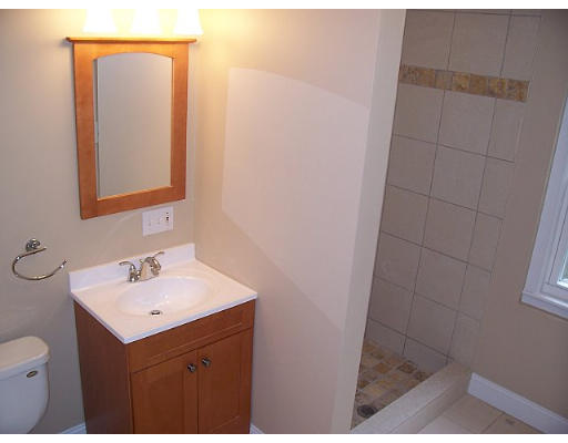 31 Harding Road Lexington, MA 02420 - Photo 8 of 16 a bathroom with a sink and a mirror