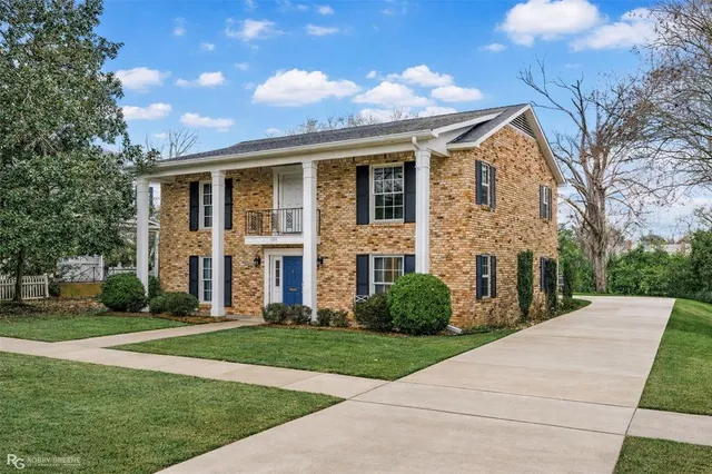 a room with a wooden table and chair