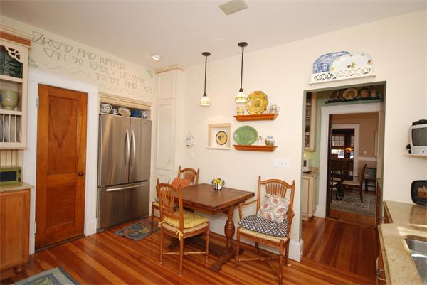 51 Winthrop Road, Unit 2 Brookline, MA 02445 - Photo 14 of 20 a view of a dining room with furniture a rug and wooden floor