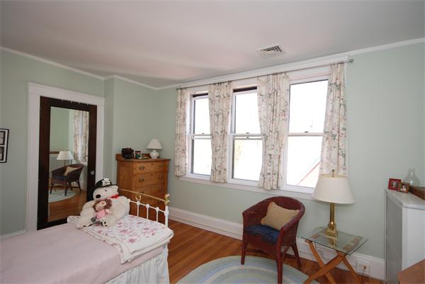 51 Winthrop Road, Unit 2 Brookline, MA 02445 - Photo 17 of 20 a living room with furniture and a window