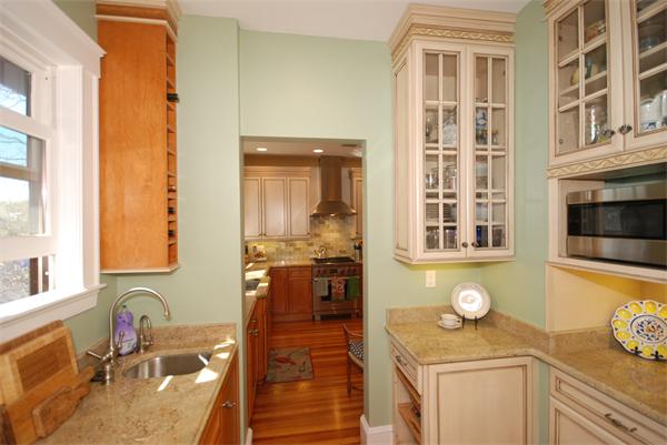 51 Winthrop Road, Unit 2 Brookline, MA 02445 - Photo 10 of 20 a bathroom with a granite countertop sink and a mirror
