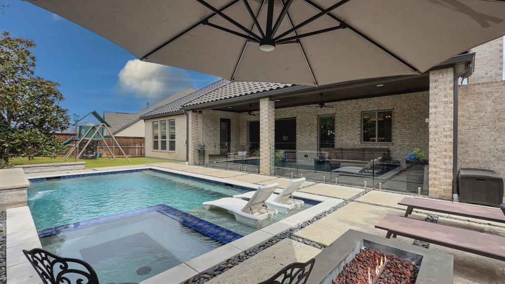 1616 Prairie Ridge Road Fort Worth, TX 76008 - Photo 2 of 40 a view of a patio with swimming pool table and chairs