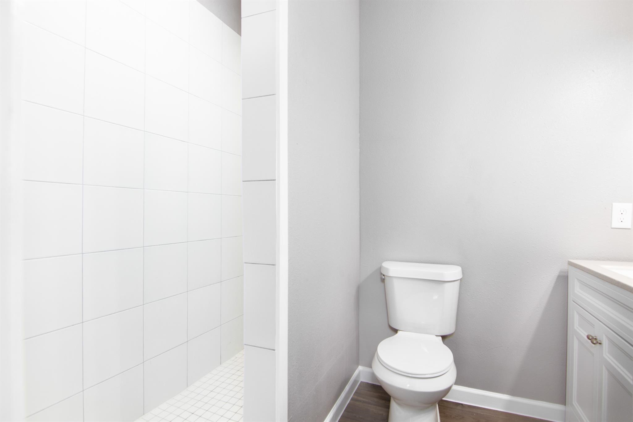 1709 Stevens Street Houston, TX 77026 - Photo 10 of 17 a a bathroom with a toilet