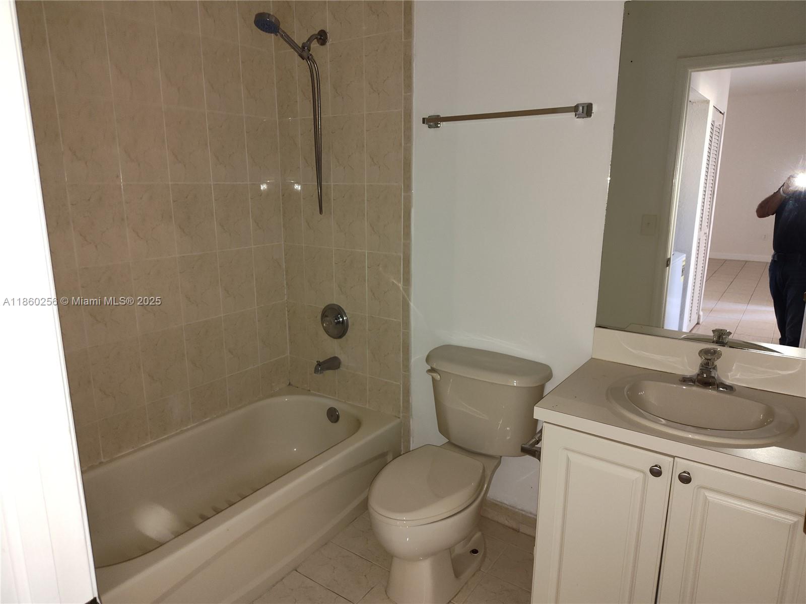 Oasis Homestead, FL 33033 - Photo 8 of 9 a bathroom with a sink toilet and shower