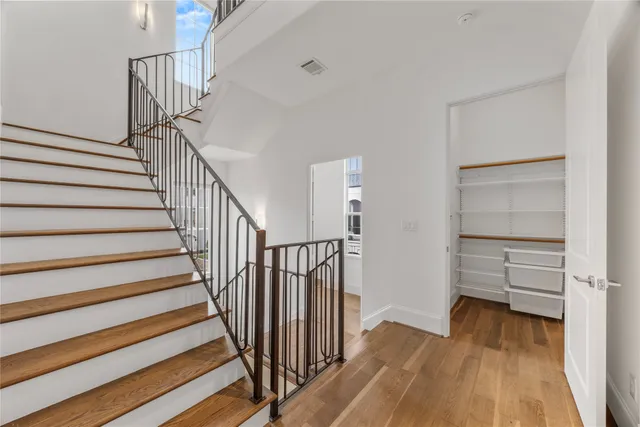 a view of entryway with wooden floor