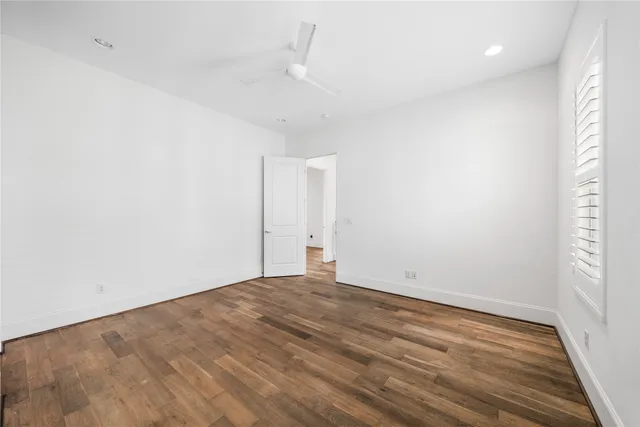 a bathroom with a toilet a sink and shower