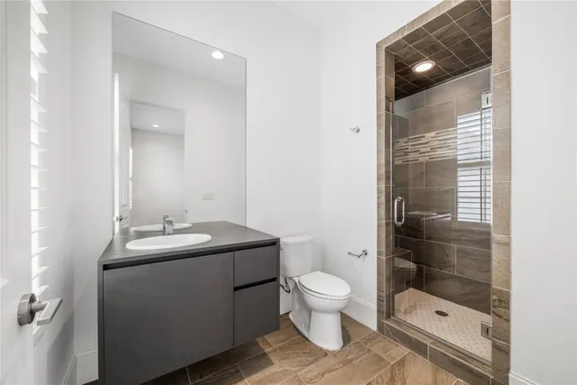 a swimming pool with outdoor seating and yard