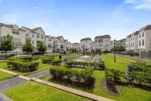 a view of a swimming pool and a chairs