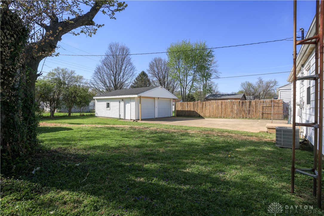 1627 Joselin Road Dayton, OH 45432 - Photo 27 of 28 This spacious backyard features a detached garage and privacy fencing, ideal for outdoor activities.