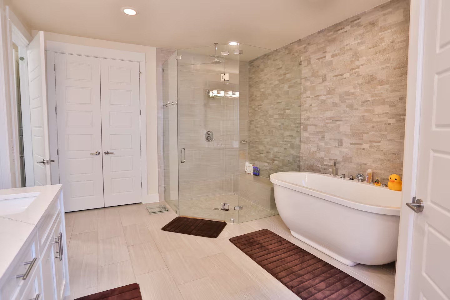 2203 Thornton Road, Unit A Austin, TX 78704 - Photo 13 of 22 Bathroom featuring vanity, a stall shower, a freestanding bath