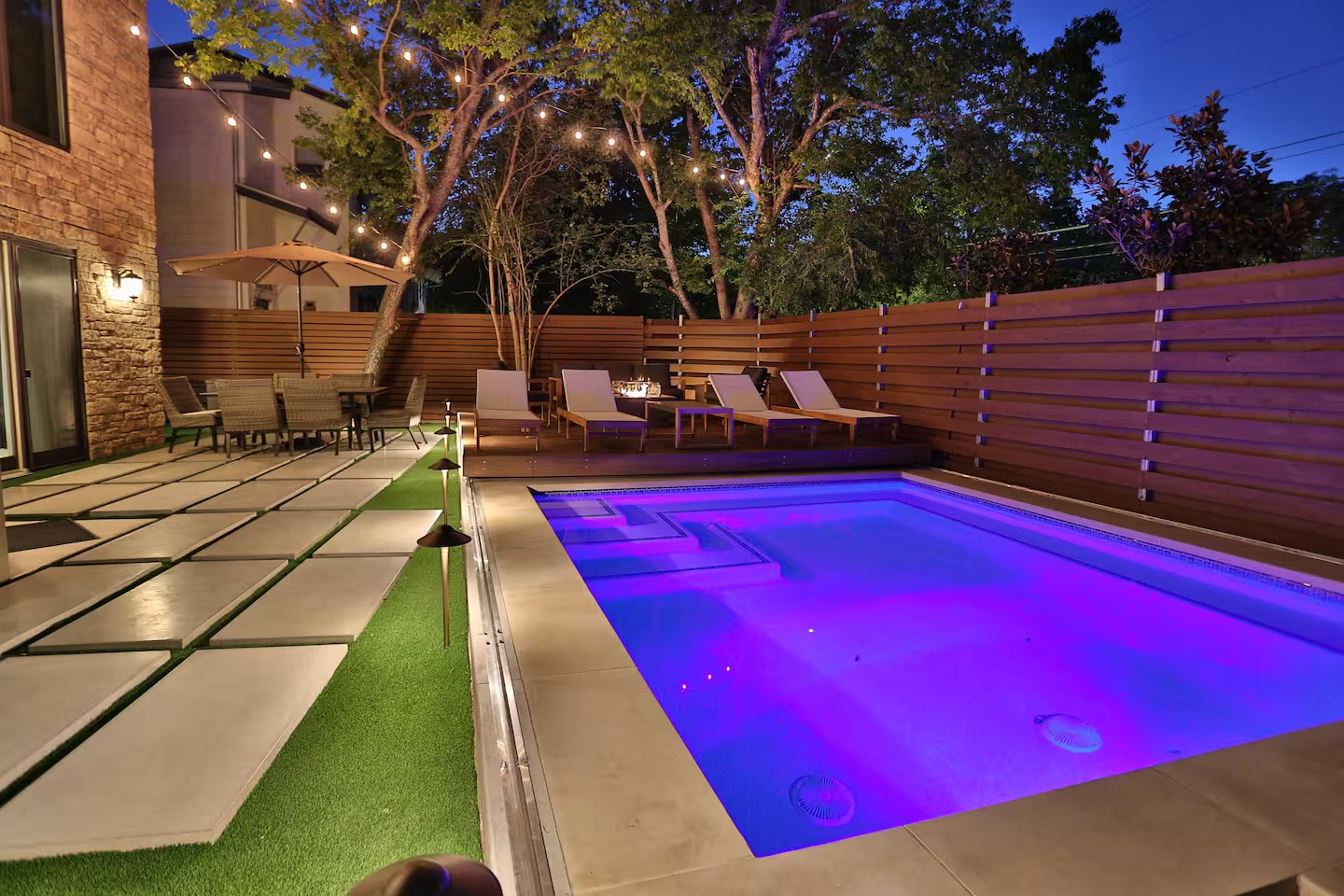 2203 Thornton Road, Unit A Austin, TX 78704 - Photo 20 of 22 View of swimming pool featuring a fenced backyard and patio surround