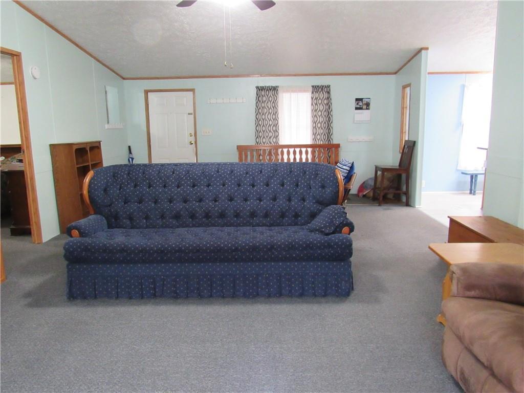 719 Joy Lane Butler, PA 16001 - Photo 11 of 36 a living room with furniture and a couch