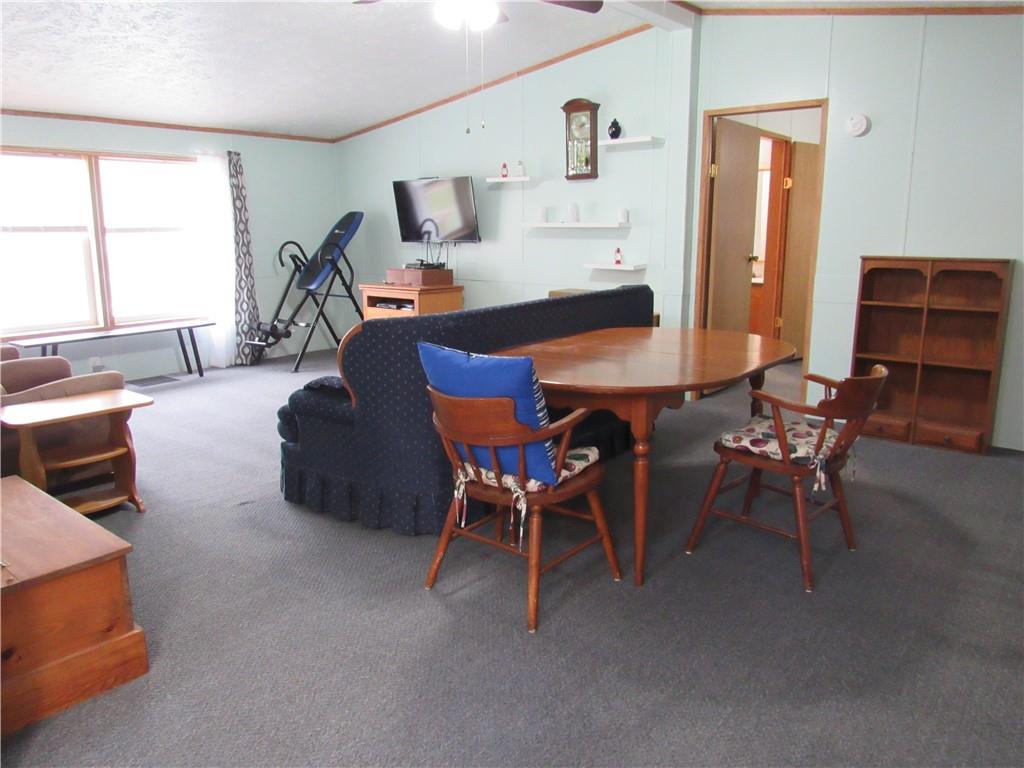 719 Joy Lane Butler, PA 16001 - Photo 12 of 36 a living room with furniture and a window
