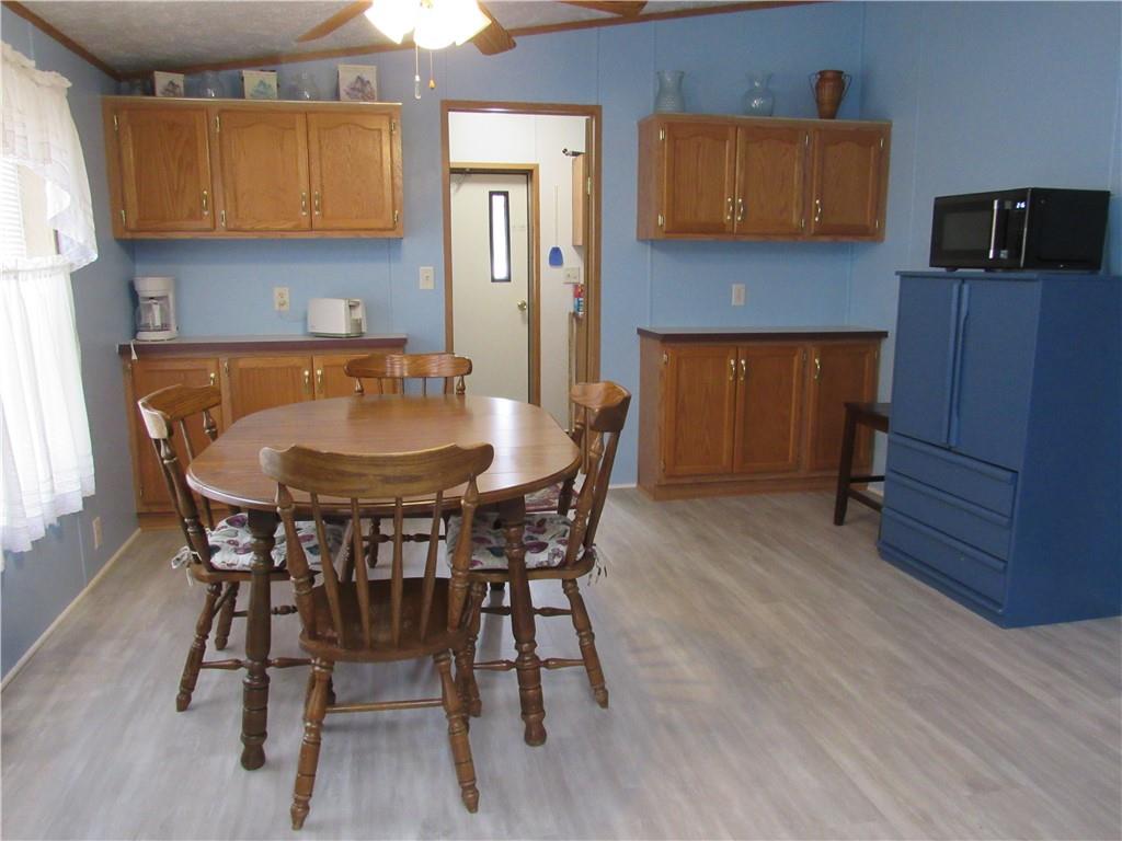 719 Joy Lane Butler, PA 16001 - Photo 17 of 36 a dining room with furniture and window