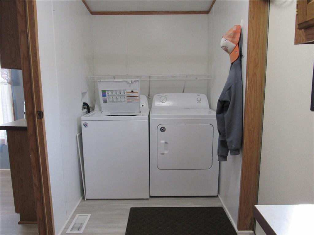 719 Joy Lane Butler, PA 16001 - Photo 20 of 36 a utility room with dryer and washer
