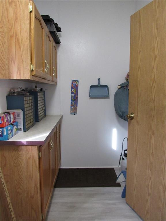 719 Joy Lane Butler, PA 16001 - Photo 21 of 36 a kitchen with a refrigerator and cabinets