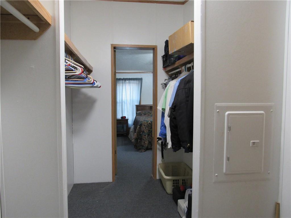 719 Joy Lane Butler, PA 16001 - Photo 26 of 36 a view of walk in closet with clothes and shoes