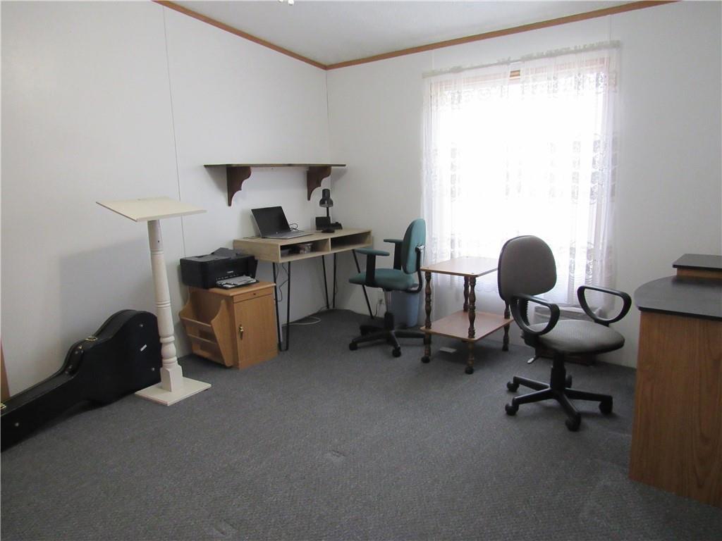 719 Joy Lane Butler, PA 16001 - Photo 33 of 36 a view of a workspace with furniture and a window