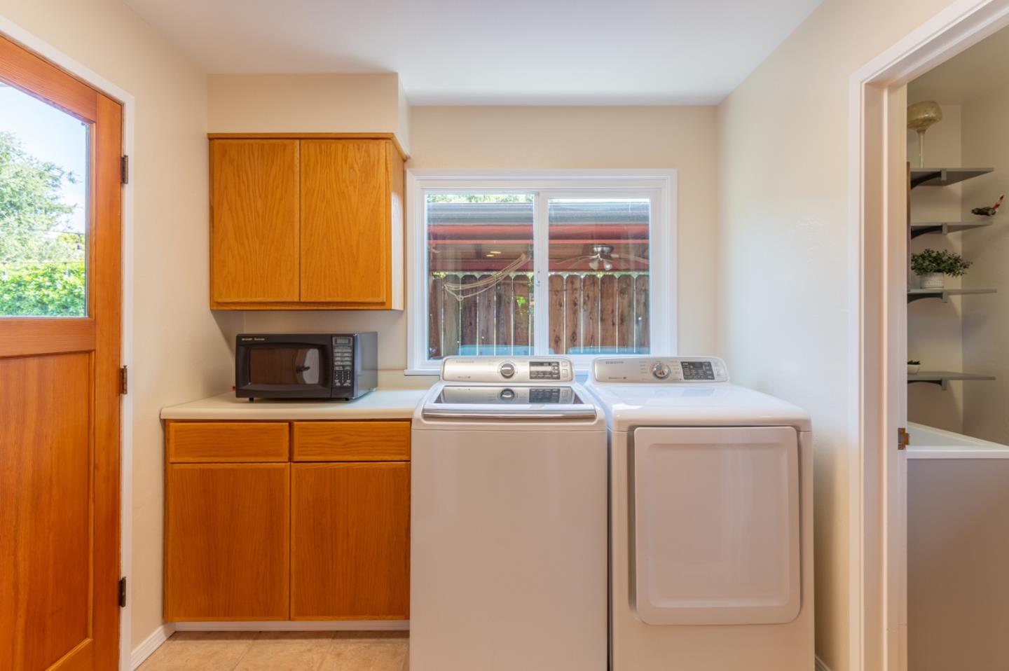 2 Merrill Way Carmel Valley, CA 93924 - Photo 18 of 43 a kitchen with a stove a sink and a refrigerator