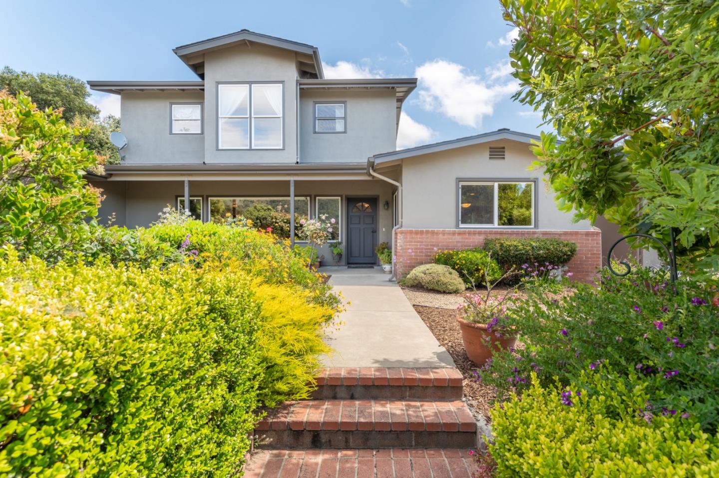 2 Merrill Way Carmel Valley, CA 93924 - Photo 2 of 43 a front view of a house with garden