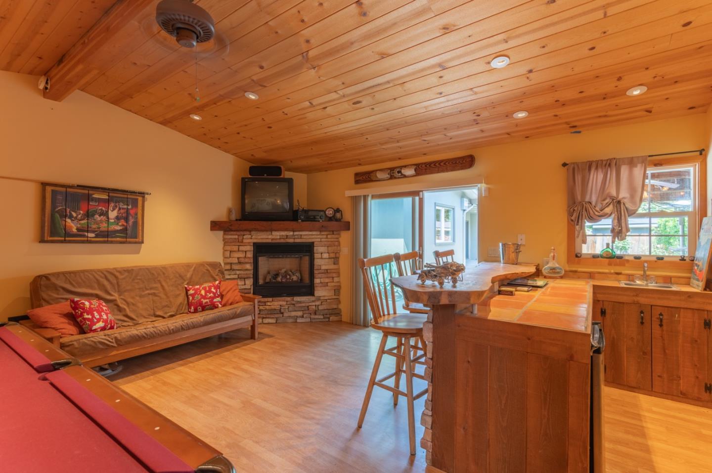 2 Merrill Way Carmel Valley, CA 93924 - Photo 38 of 43 a living room with furniture a fireplace and a flat screen tv
