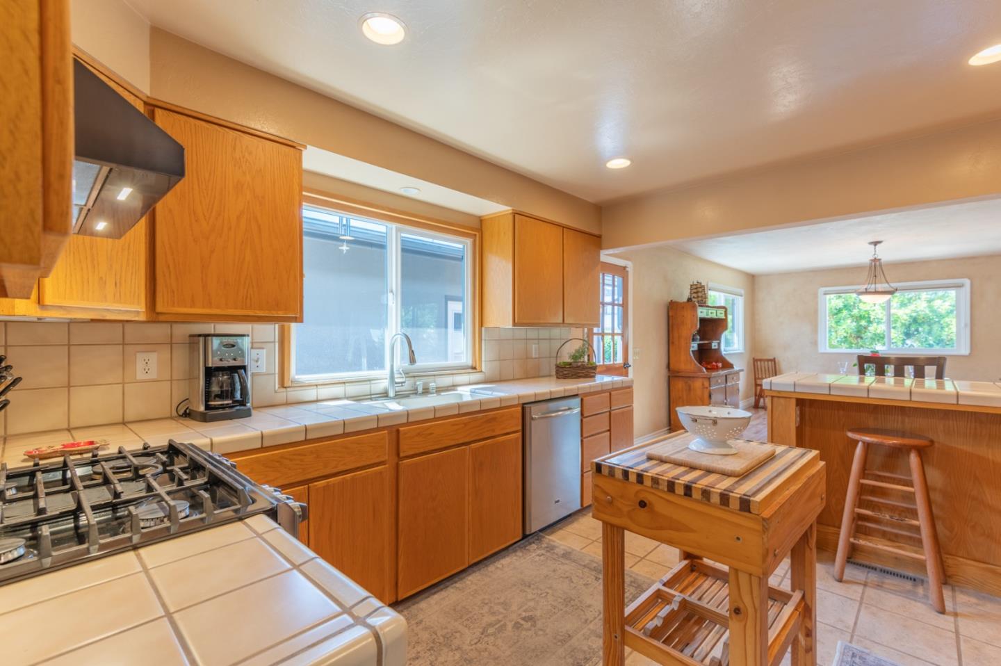 2 Merrill Way Carmel Valley, CA 93924 - Photo 4 of 43 a kitchen with a sink and a stove top oven