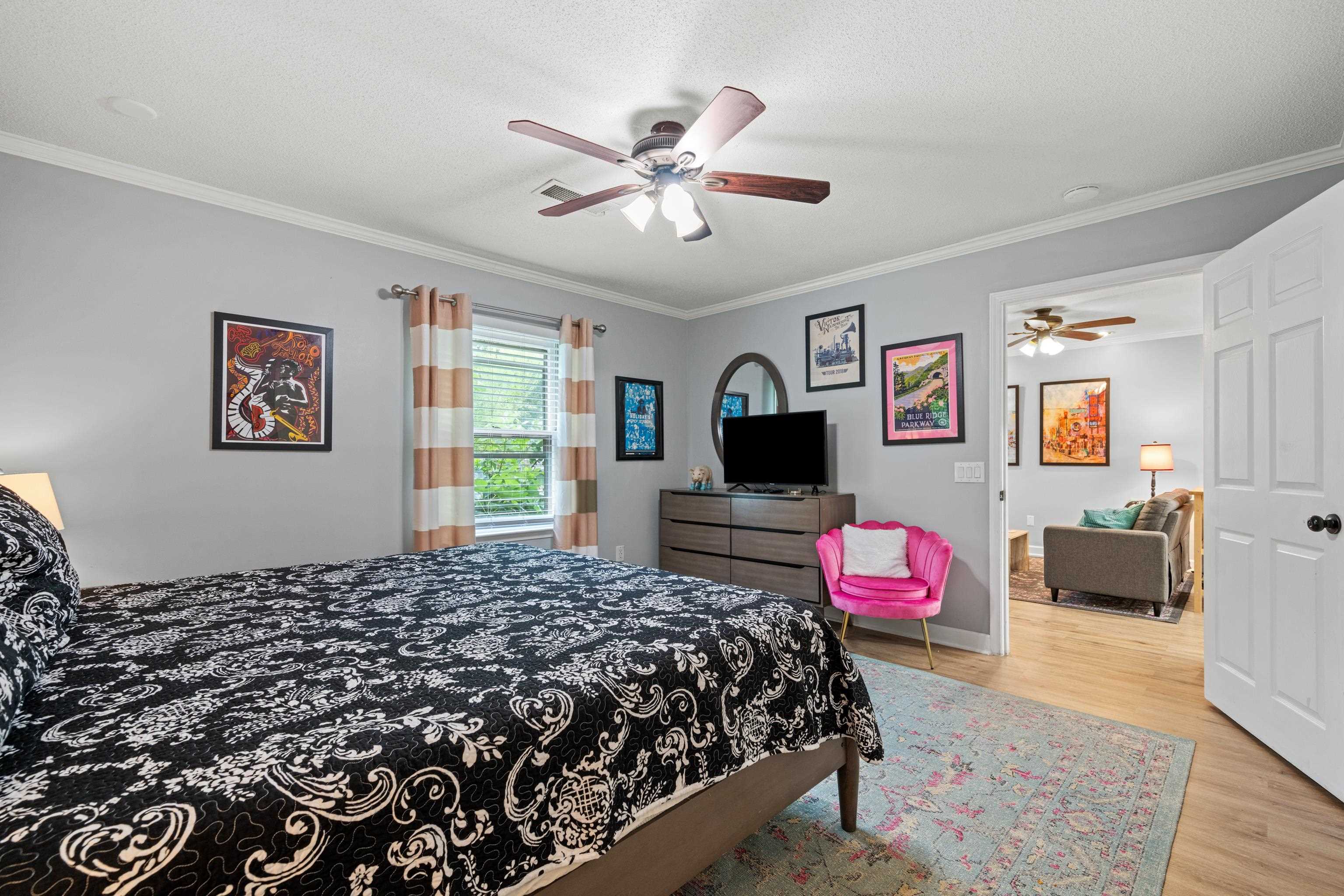 4470 Princeton Road Memphis, TN 38117 - Photo 20 of 32 a bedroom with a bed and a couch