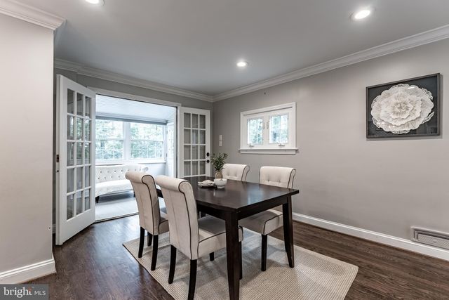 a house with trees in front of it