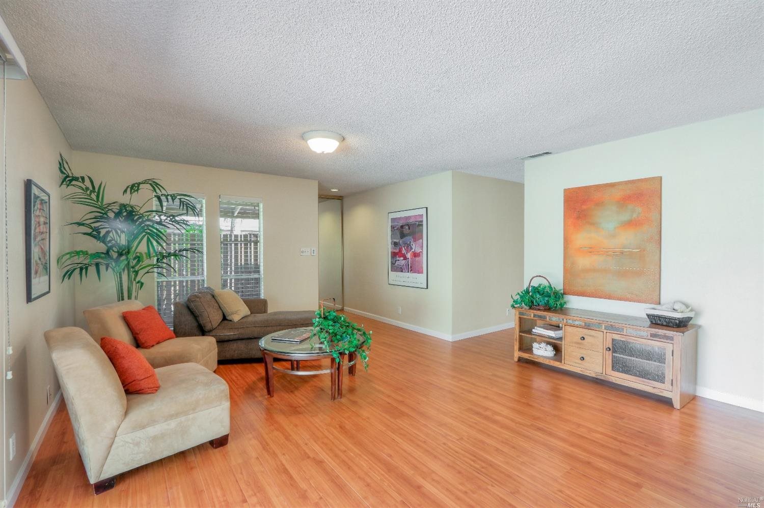 73 Roundtree Boulevard San Rafael, CA 94903 - Photo 1 of 1 a living room with furniture and a wooden floor