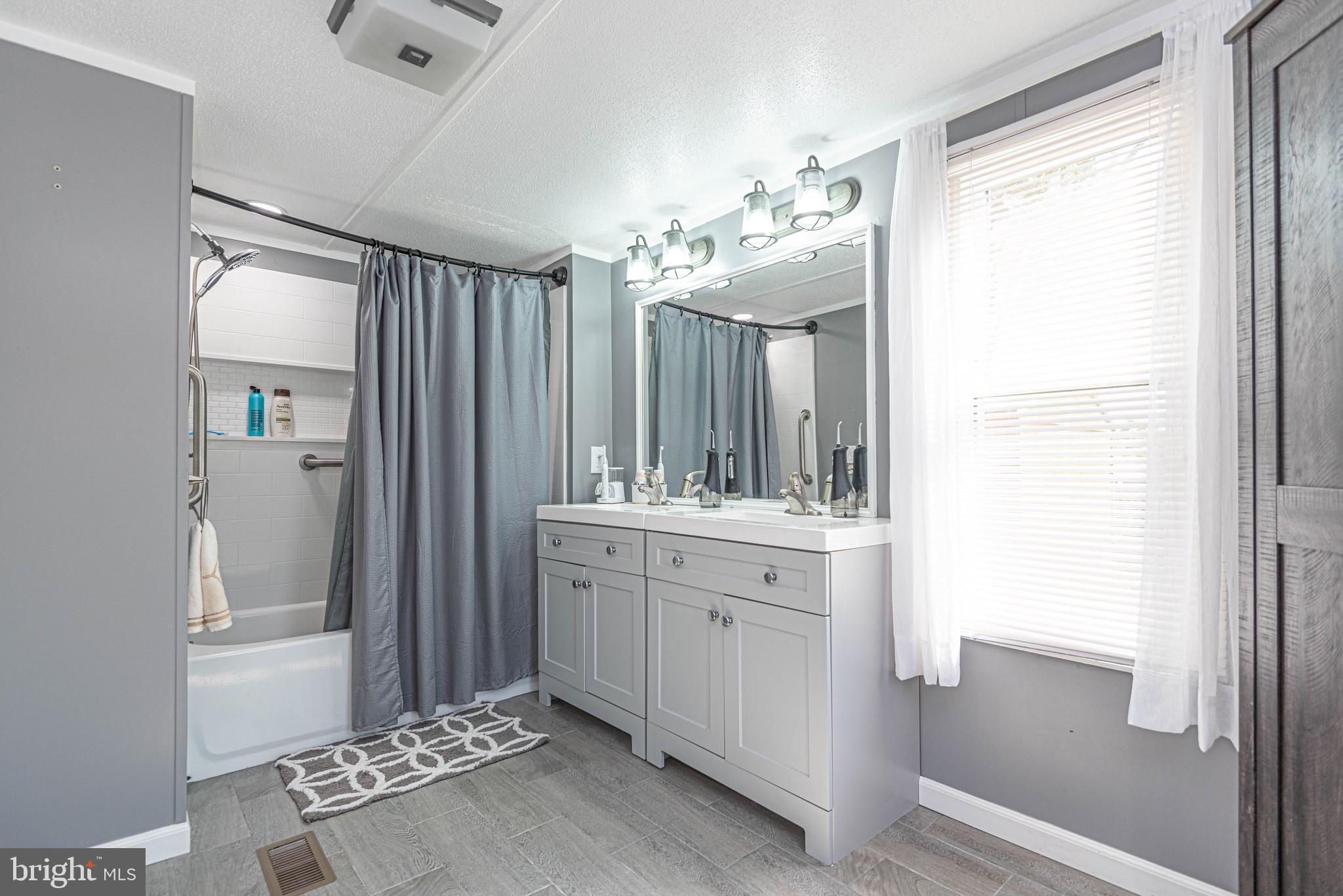 31582 Janice Road, Unit 54584 Lewes, DE 19958 - Photo 21 of 28 Master bathroom