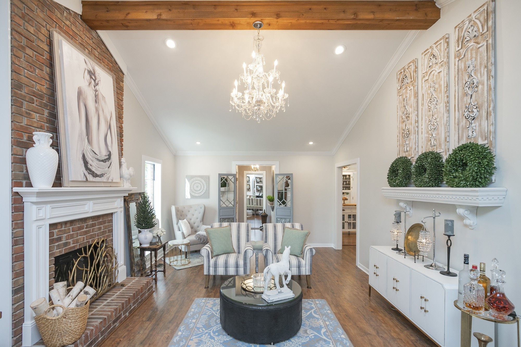 3005 Country Meadow Road Antioch, TN 37013 - Photo 6 of 20 The living room boasts of a high ceiling, cozy fireplace and hardwood floors! (This picture was taken when home was previously staged)